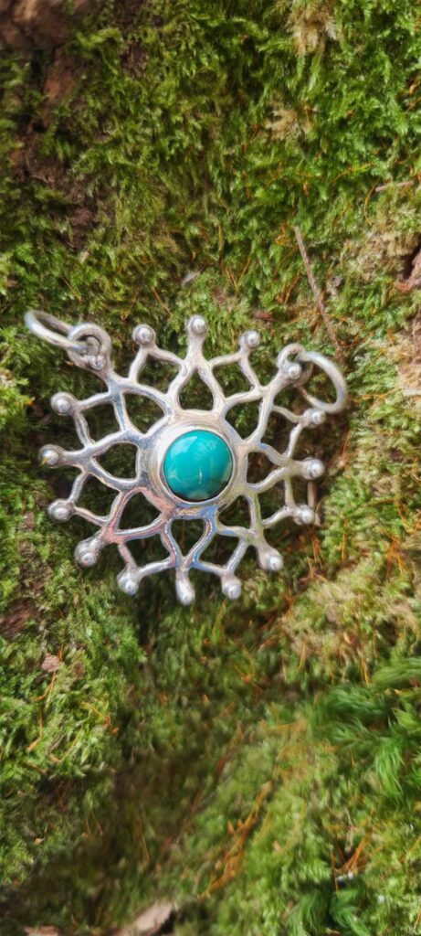 Silver Lotus Snowflake Pendant front